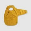 Buy 👏 Kikadu Bib with Sleeves Mustard 👏